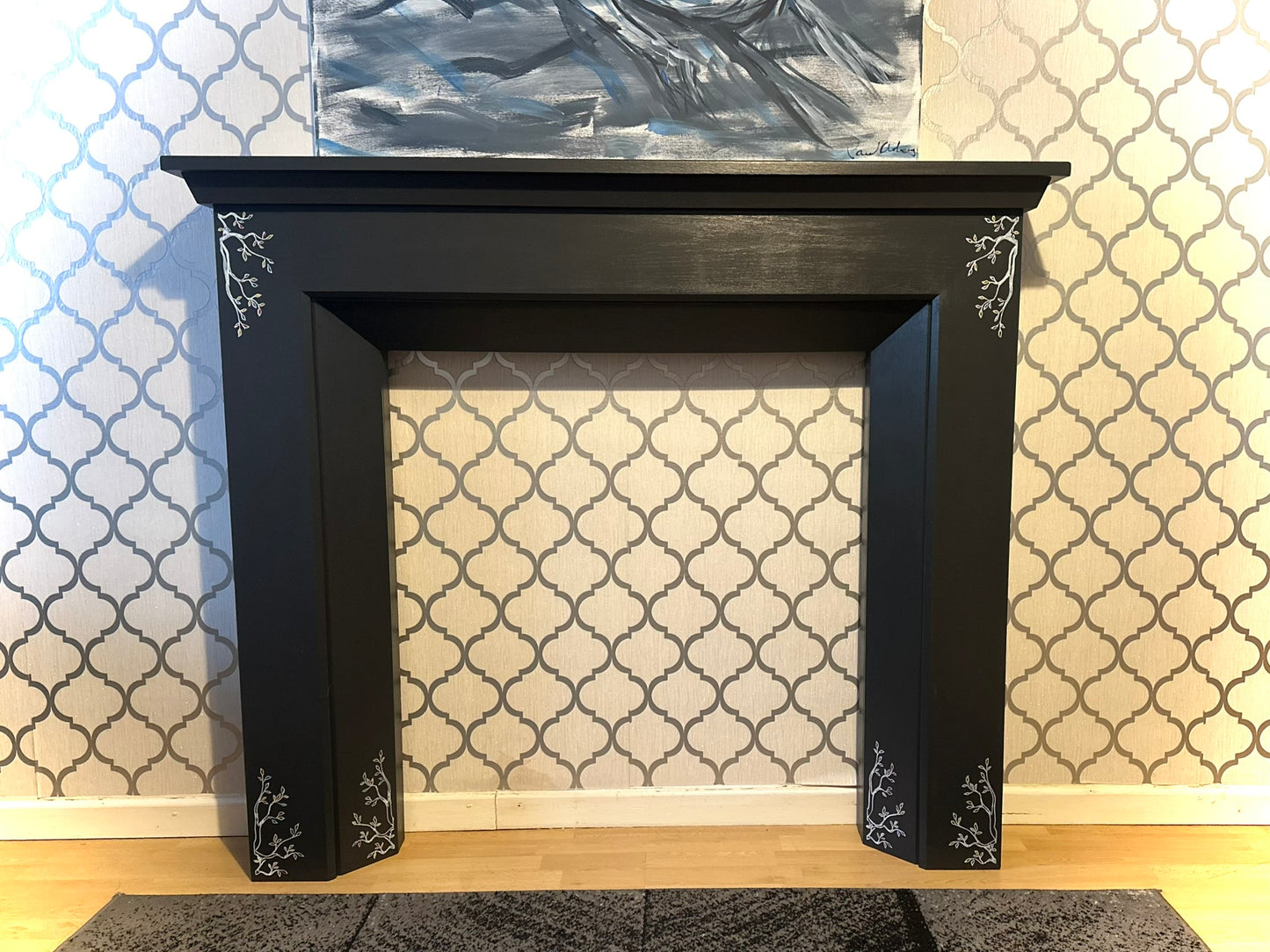 Charcoal Grey Fireplace Surround with decorative detailing