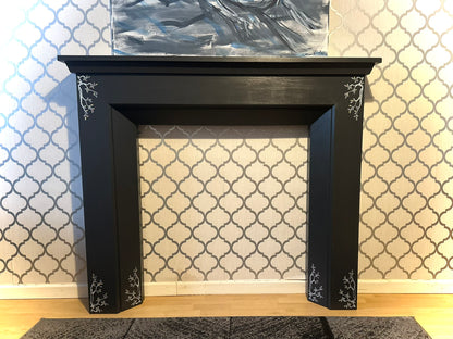 Charcoal Grey Fireplace Surround with decorative detailing